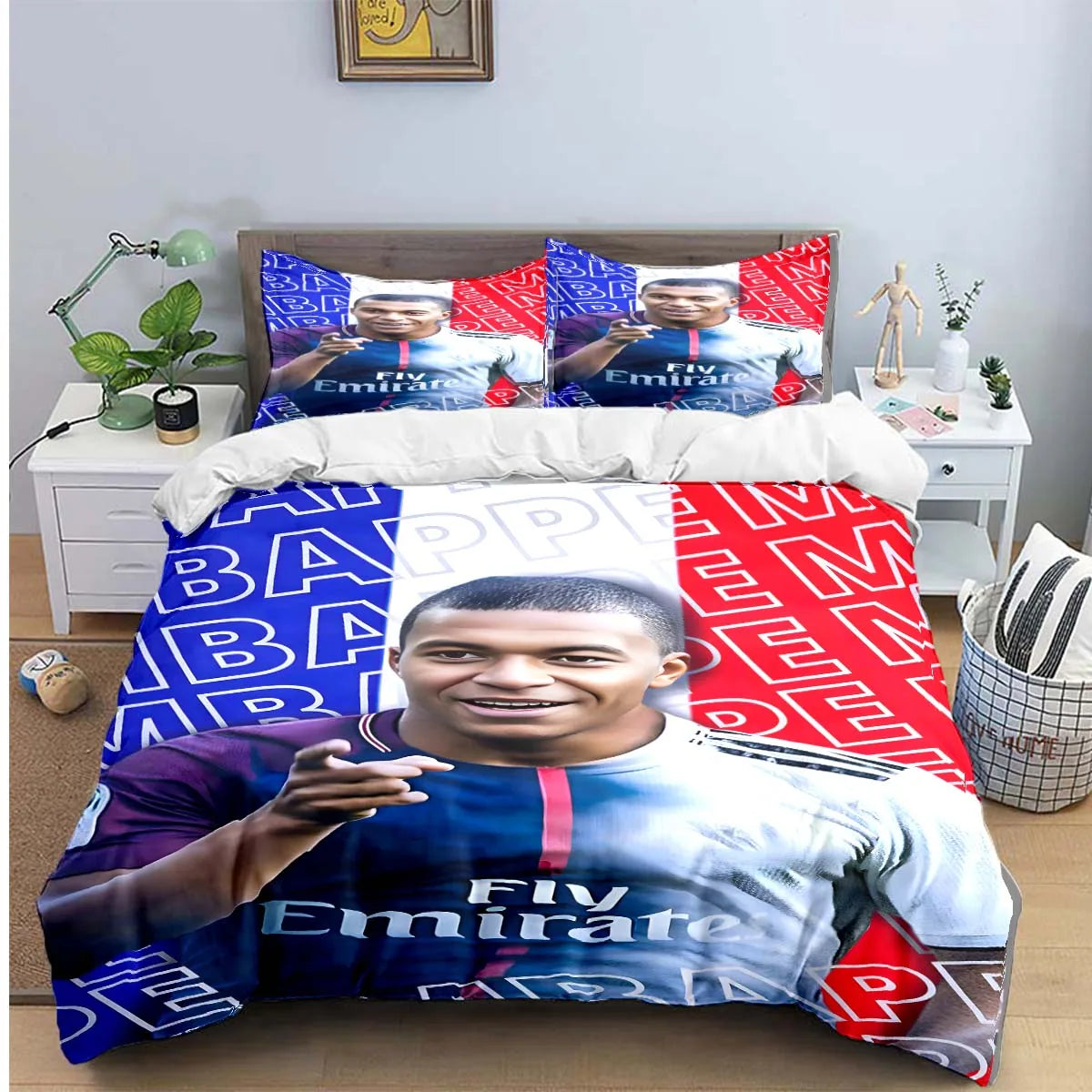 A soccer player graphic duvet cover featuring a smiling man in a blue and white jersey on a red background.