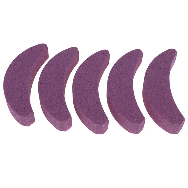 A set of five purple portable chainsaw sharpeners with whetstones arranged in a row.
