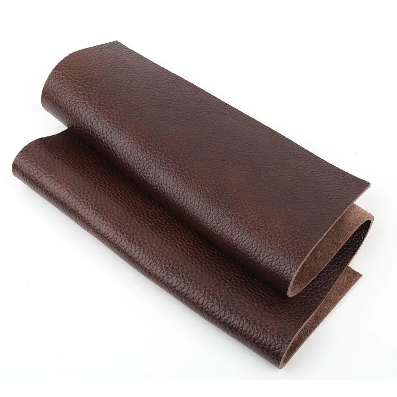 A roll of dark brown top-grain cowhide leather fabric, 4mm thick.