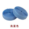 Blue sew-on hook and loop tape strip rolled into a cylinder