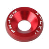 A close-up view of a red aluminum alloy washer or bolt, marked with Japanese characters.