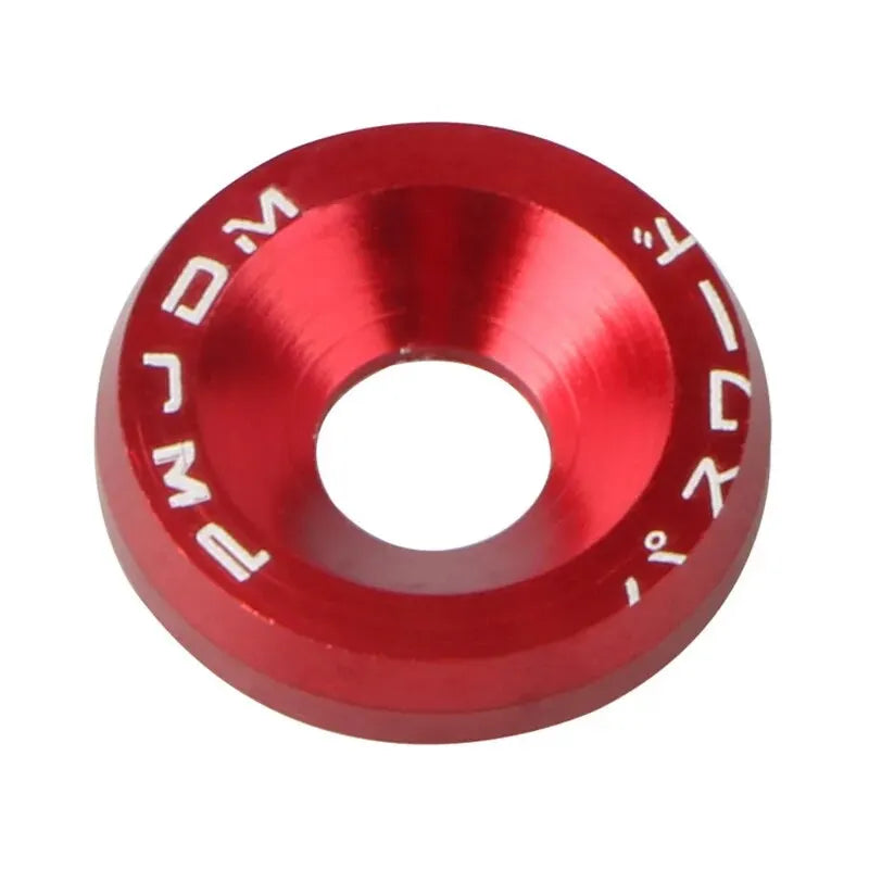 A close-up view of a red aluminum alloy washer or bolt, marked with Japanese characters.