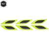 A set of six reflective carbon fiber car styling strips in lime green color.