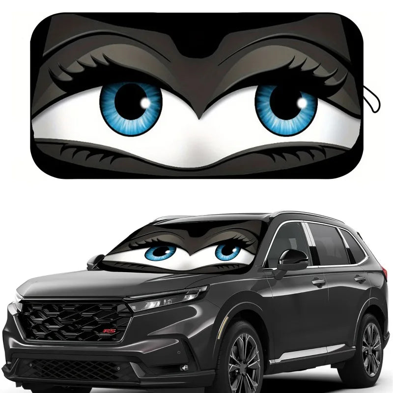 A cartoon folding car sunshade featuring an eye design placed on a black SUV.