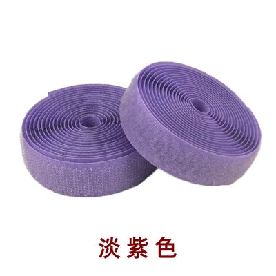 Purple sew-on hook and loop tape 20mm nylon fastener strip rolled up