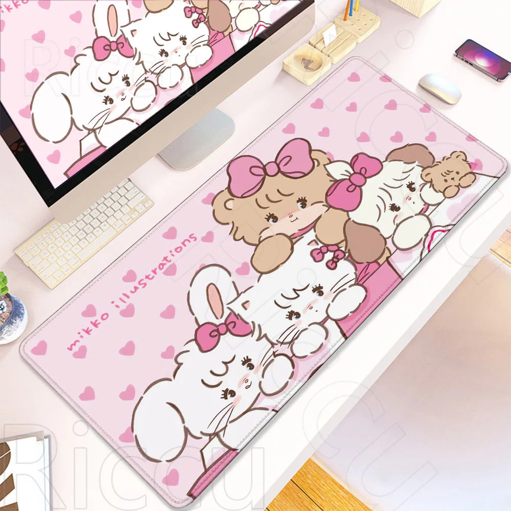 Pink kawaii cartoon illustration desk mat featuring fluffy white rabbits and pink bows