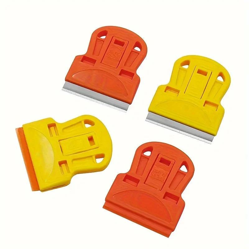 Three plastic scrapers in orange and yellow colors for removing stickers, glue, and paint.