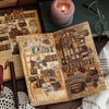 A close-up of a vintage-style journal page featuring detailed illustrations and text, surrounded by antique objects and a lit