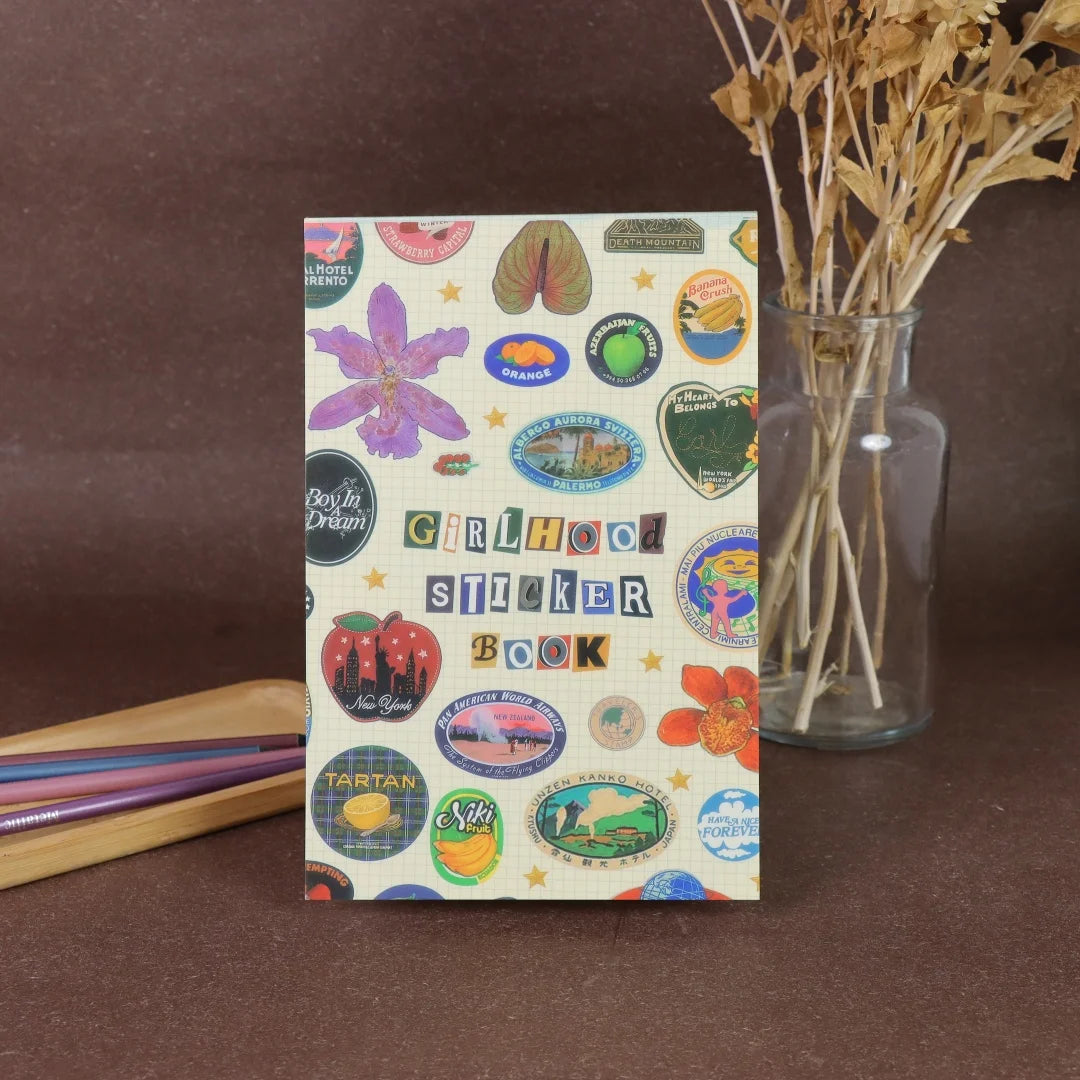 A colorful sticker book featuring fruit and letter designs for scrapbooking and journaling.