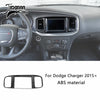 Carbon fiber interior trim kit for Dodge Charger featuring a steering wheel and dashboard controls