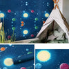 A fabric tent decorated with a dark blue starry universe pattern, featuring planets and nebulas.