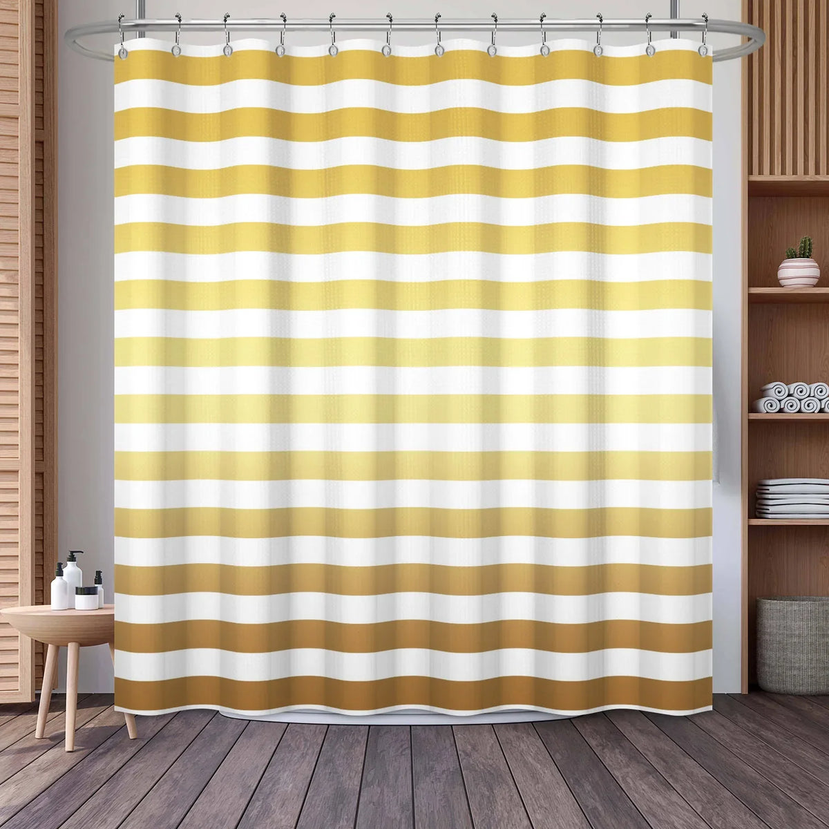 A shower curtain featuring a vertical stripe pattern of alternating gold and white horizontal stripes.