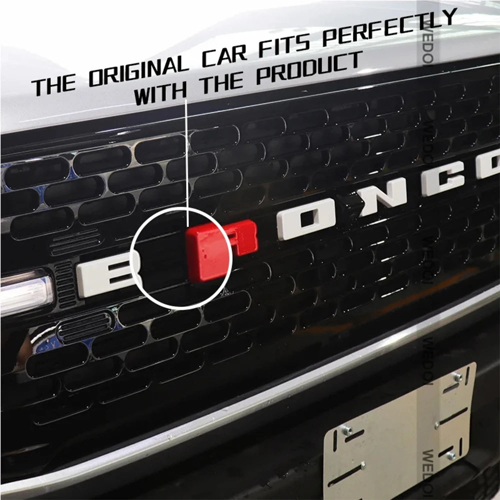 A red 3D ABS emblem letter cover fits perfectly on a Ford Bronco grille.