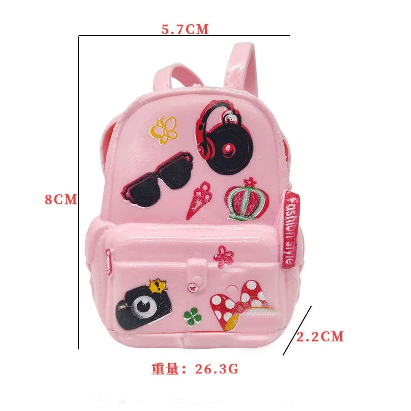 Pink fashion doll accessories set featuring a backpack with various doll items