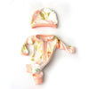 A pink and green floral jumpsuit outfit for a baby doll.