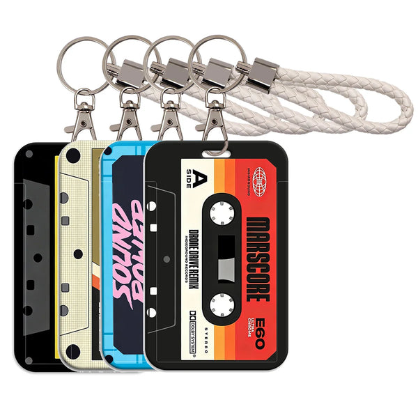 A black card holder shaped like a cassette tape with an orange and yellow stripe, attached to a keychain.