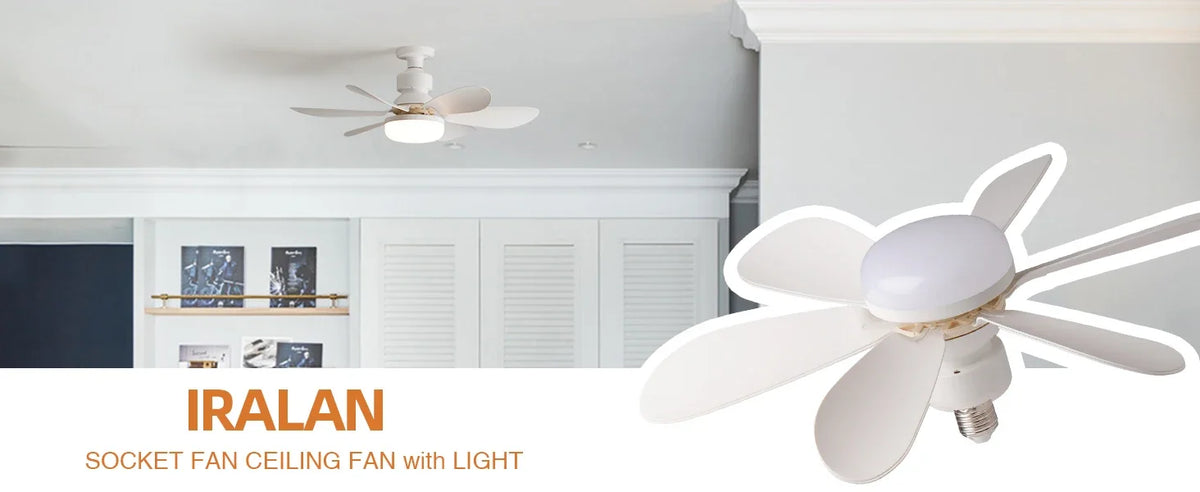 A white ceiling fan with a light fixture mounted on a white ceiling in a modern kitchen setting.