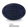 A ball of dark navy blue extra thick chenille yarn for hand knitting.