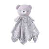 A soft lavender teddy bear stuffed animal with a floral patterned blanket.