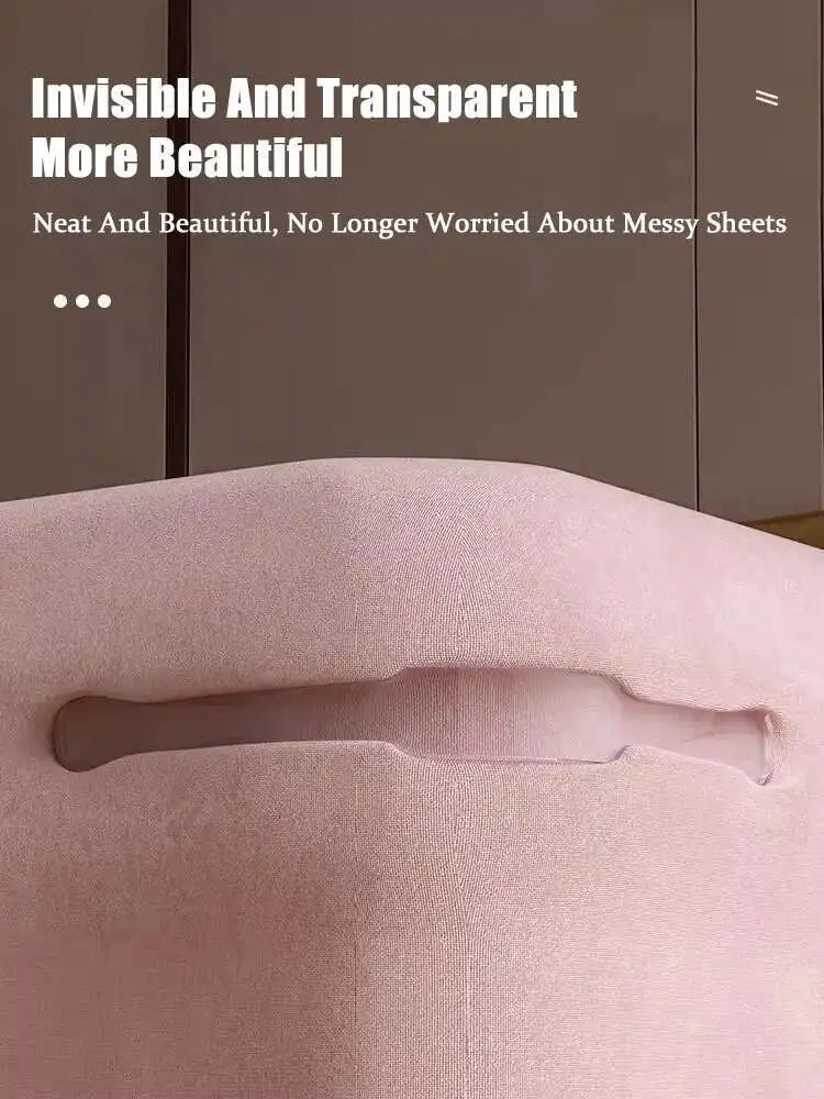 A close-up of a pink, smooth fabric object with a translucent section, likely a bed sheet holder clip.