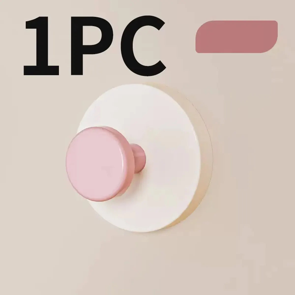 A single pink suction cup hook is shown against a light background.
