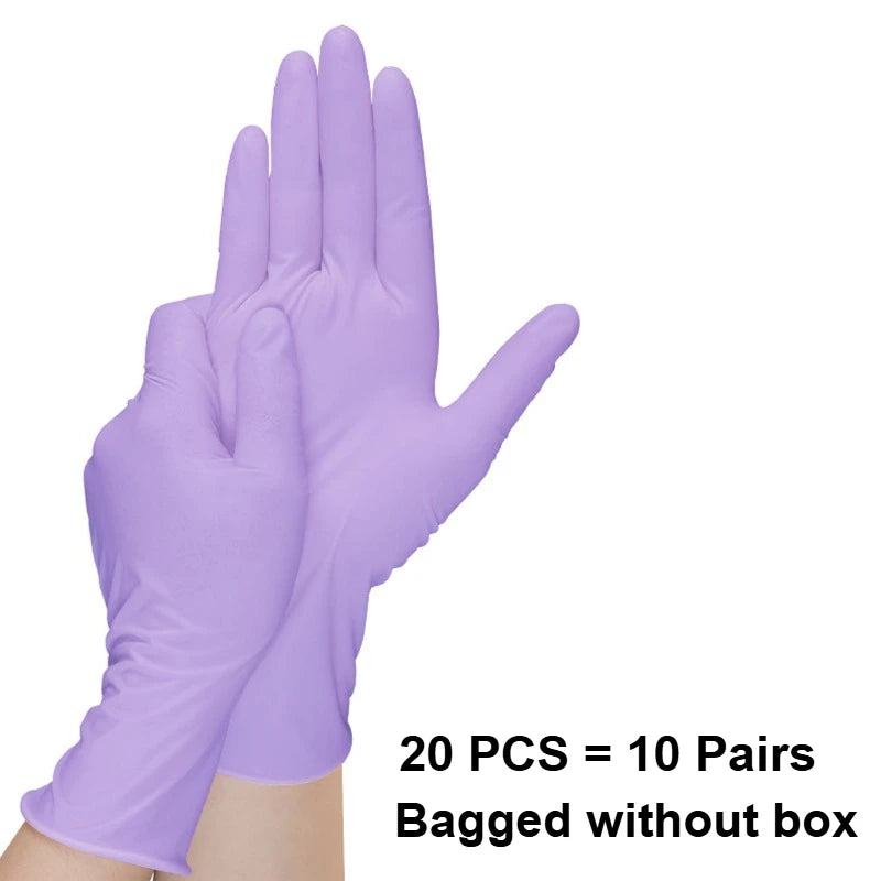 A pair of disposable purple nitrile gloves is shown against a white background.