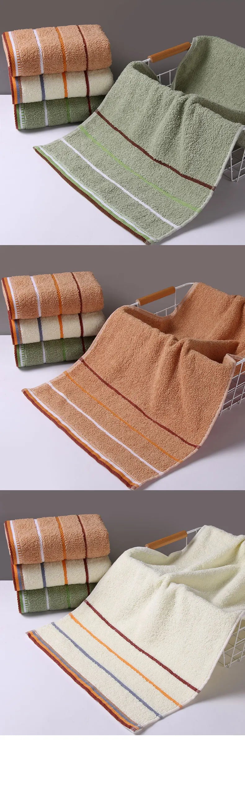 A set of three folded bath towels in shades of green, beige, and white cotton.