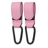 A pair of pink PU leather stroller hooks with black accents for organizing baby bags.