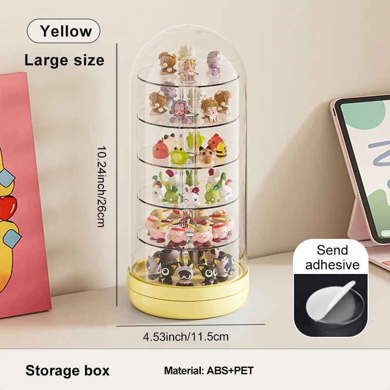 A tall, clear acrylic storage box with multiple tiers displaying small collectibles and keepsakes.