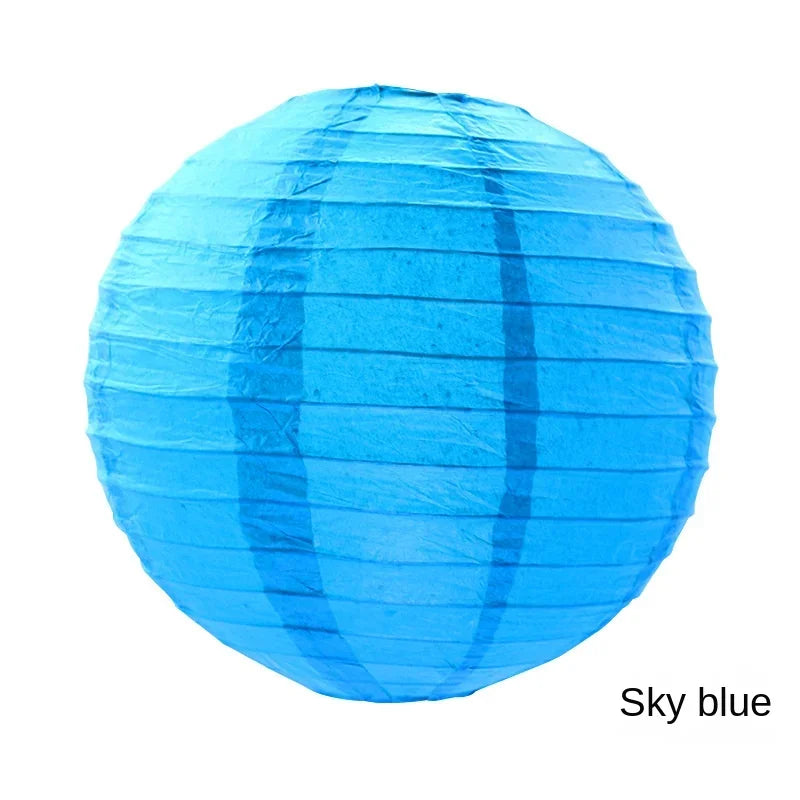 A bright sky blue round paper lantern.