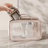 A hand is opening a portable travel soap box with a drainage lid, revealing various skincare products inside.