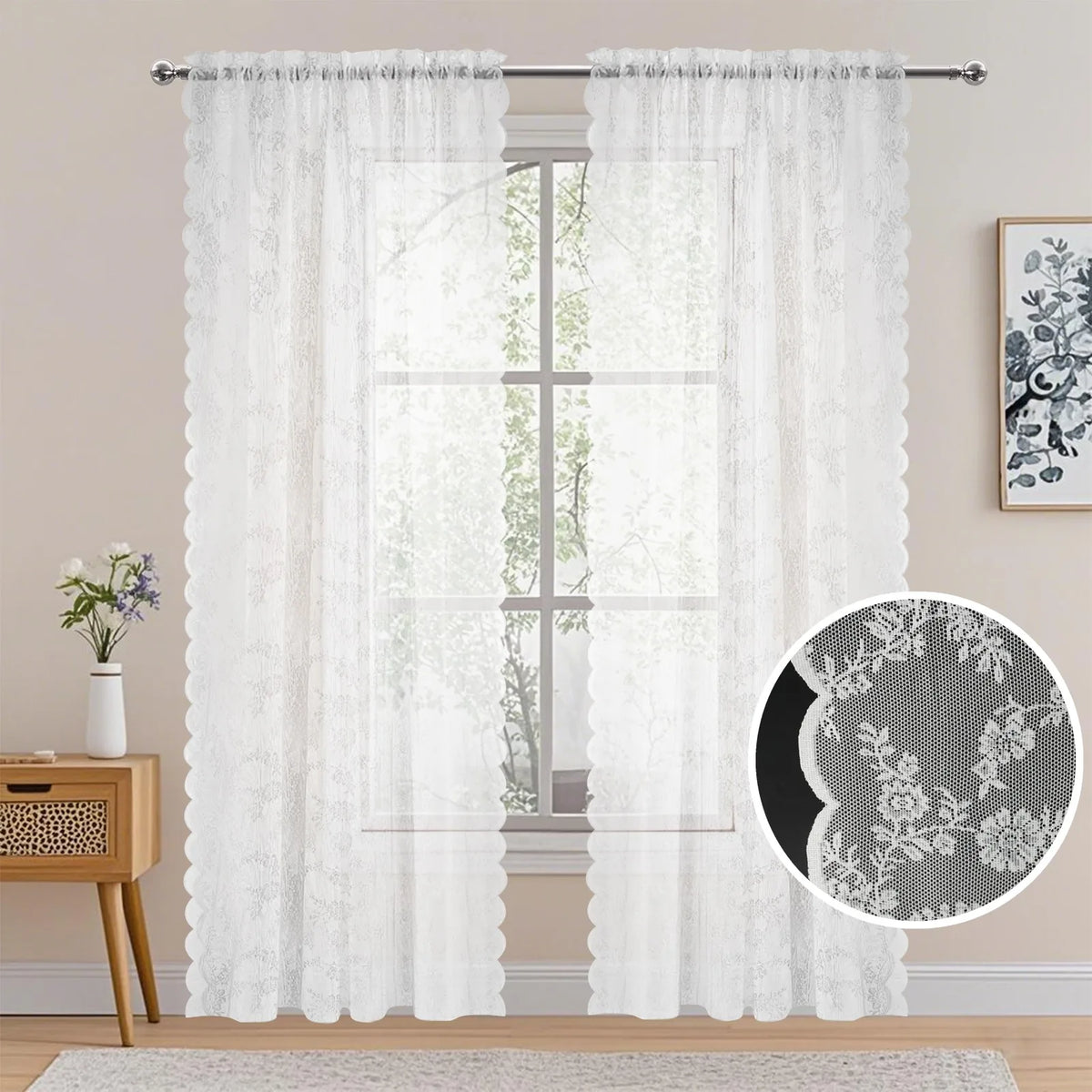 White sheer curtains with vintage floral lace pattern hanging in a window.
