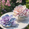A cluster of pink and purple rose blooms in a white vase on a light table, with silicone molds for chocolates nearby.