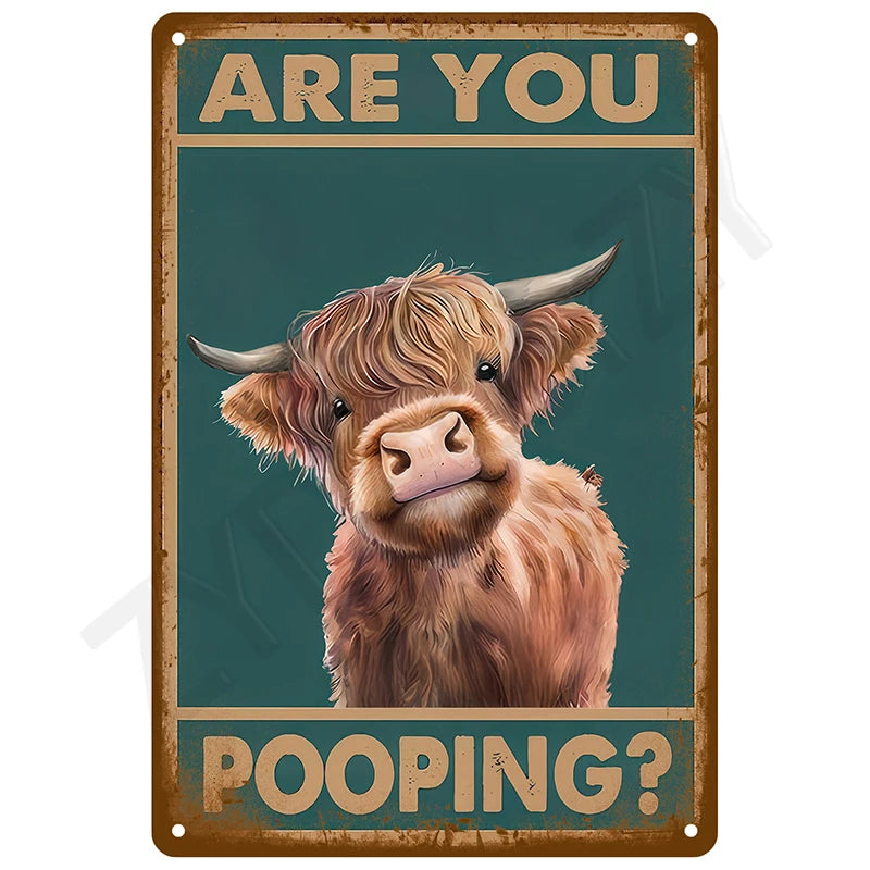 A vintage metal tin sign featuring a close-up portrait of a brown goat looking directly at the viewer with text asking Are yo