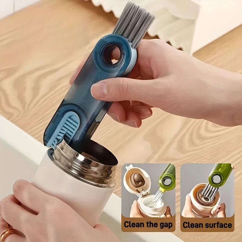 Hands are cleaning a glass bottle with a blue brush set for gap and surface cleaning.