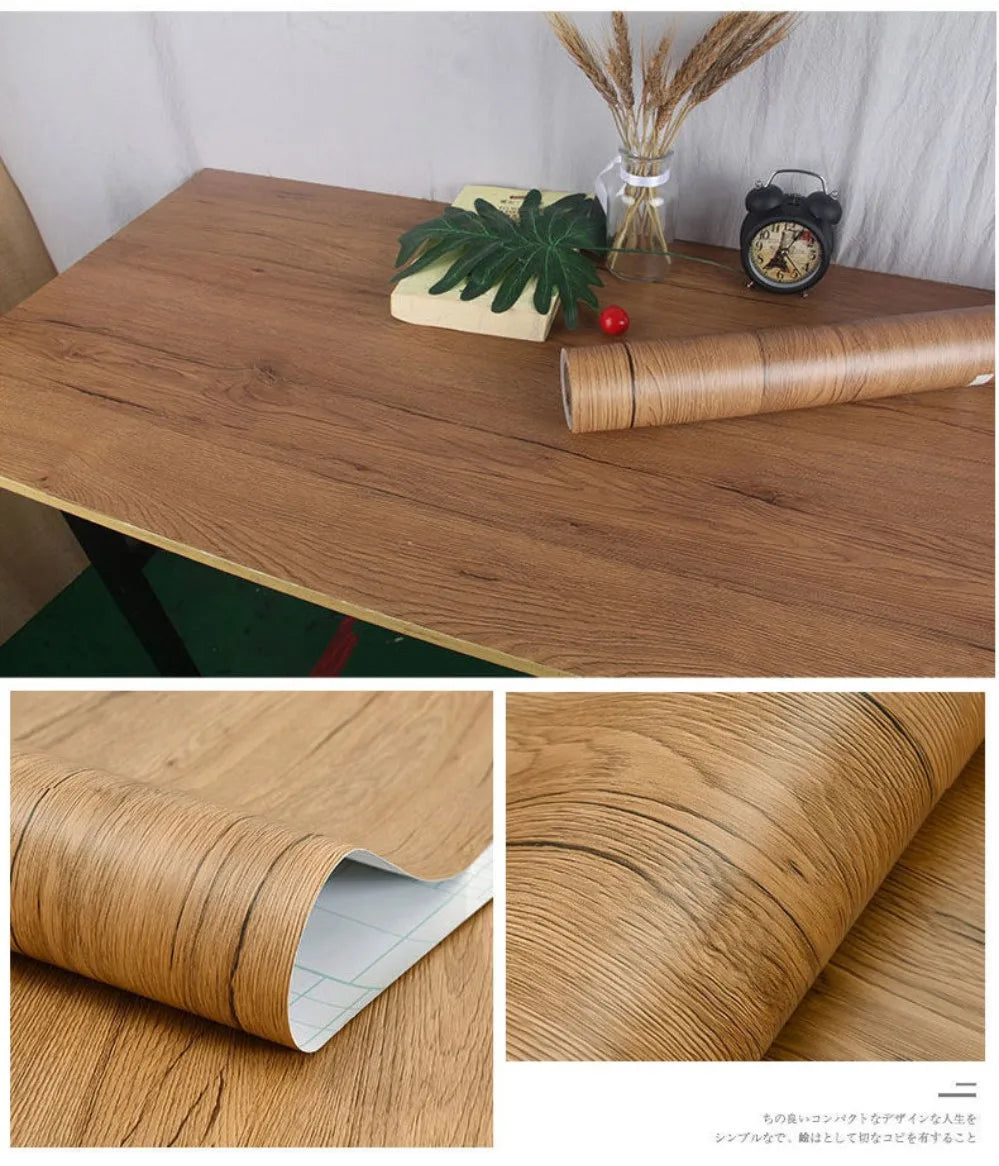 Roll of self-adhesive wood grain wallpaper film showing the texture and grain pattern on a wooden surface.