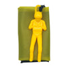 A yellow hand-throw parachute toy with a black mini soldier, displayed against a olive green fabric background.