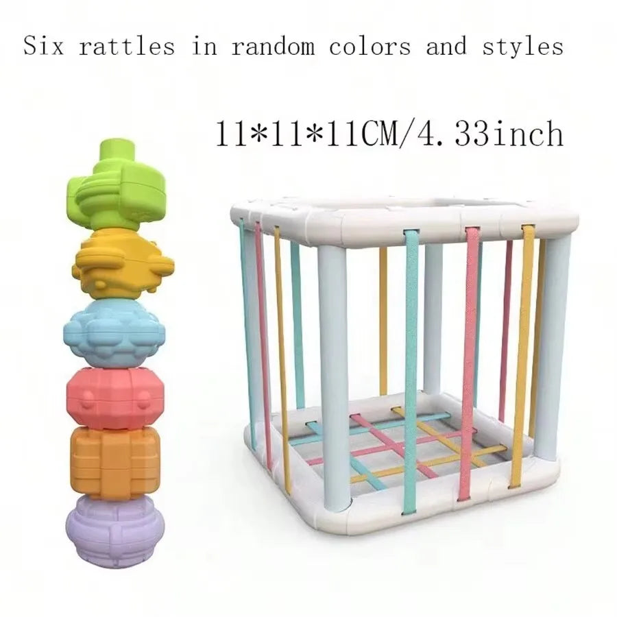 A Montessori rainbow grasping ball with rattle, teether, and shape sorter in various colors.