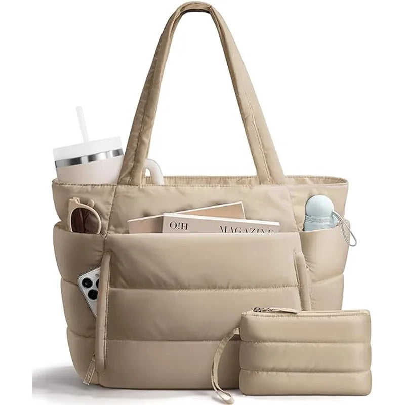 A beige quilted multi-compartment tote bag with a handle and a separate zippered pouch.