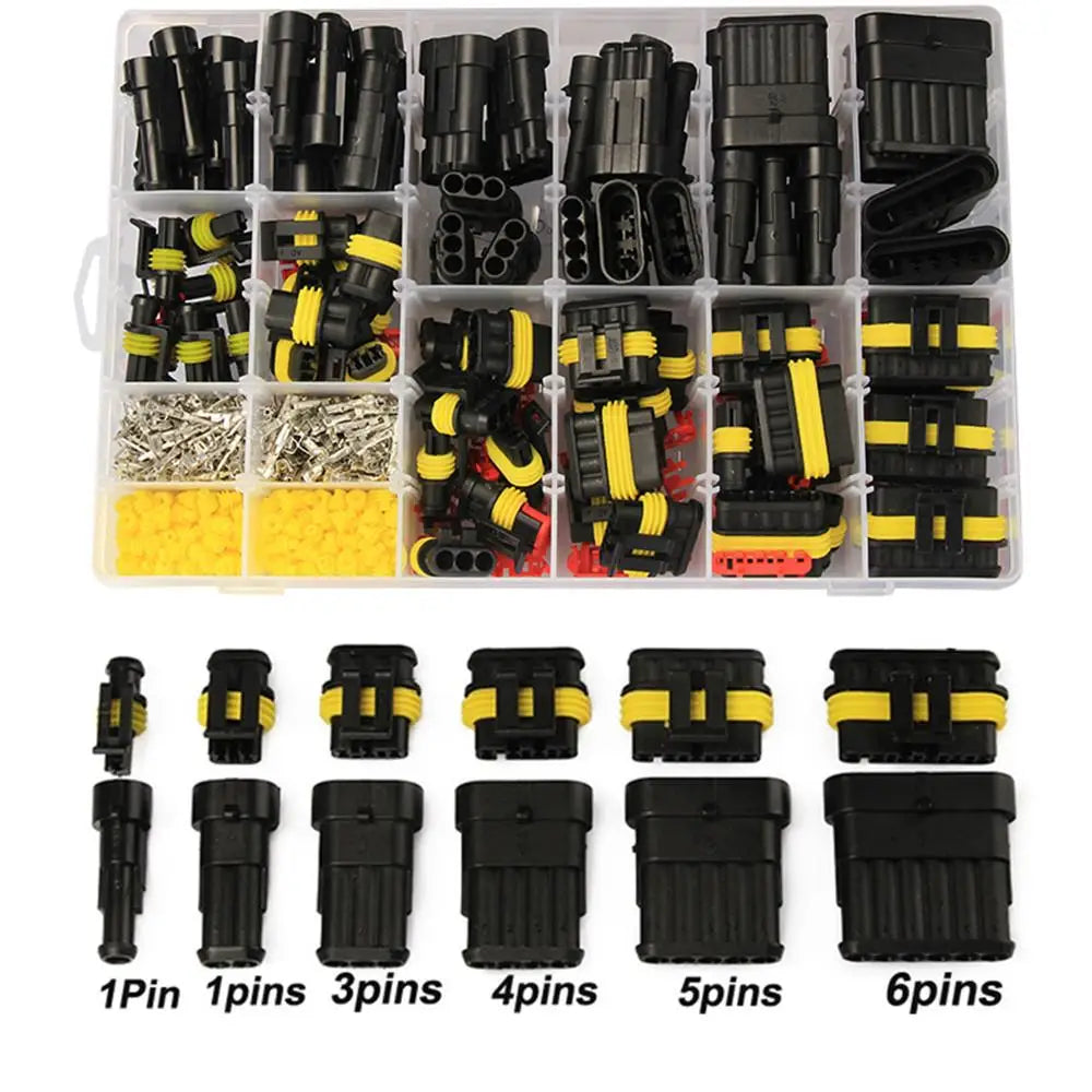 A plastic kit containing various waterproof automotive electrical connectors with male and female terminals in black and yell