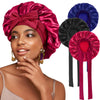 A woman models a satin sleeping bonnet in deep pink, with matching fabric accessories shown beside it.