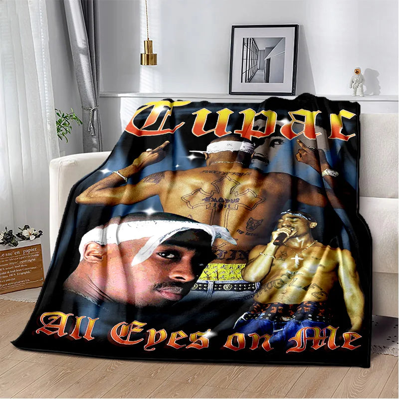 A black throw blanket featuring portraits of Eminem and Tupac with the text All Eyes On Me