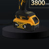 A yellow and black DEWALT XR 20V lithium-ion cordless impact driver tool resting on a dark surface.
