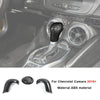 Carbon fiber interior trim kit for Chevrolet Camaro featuring a leather-wrapped shifter boot and steering wheel knob.