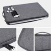 A gray waterproof laptop sleeve with a handle is shown, featuring a padded interior and multiple compartments.
