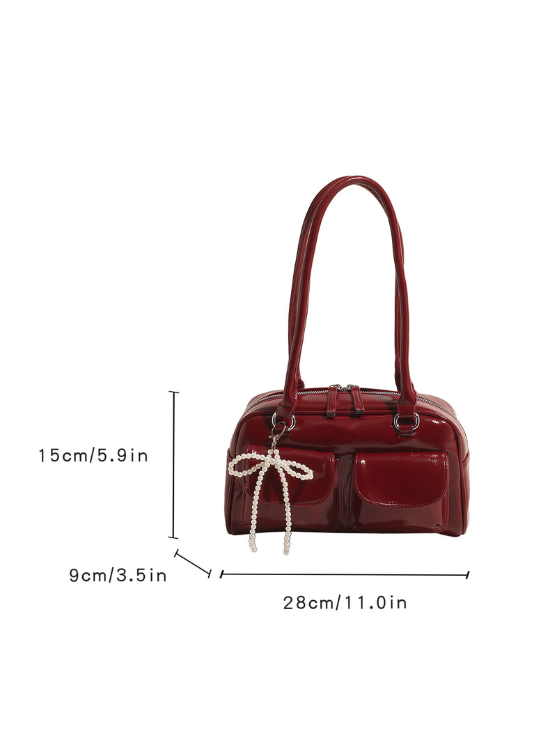 Bolso de hombro suave con detalle de lazo