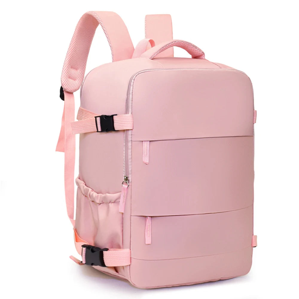 A pink compact cabin travel backpack with pink straps and black accents.