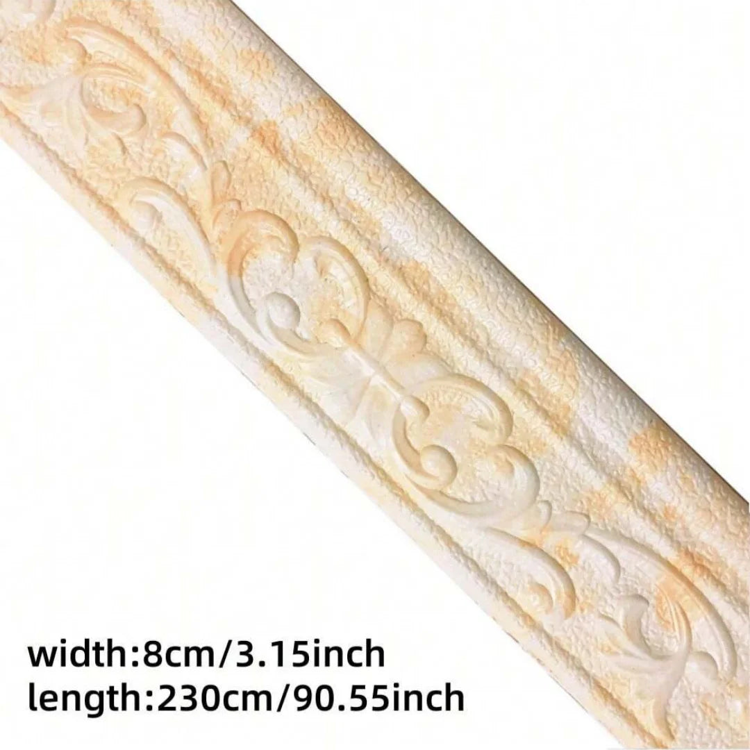 A close-up of a beige foam wall trim border sticker with decorative scrollwork for skirting lines.