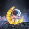 A luminous astronaut moon model built from micro blocks set against a dark, starry background.