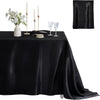 Black satin tablecloth set featuring a square cover, candles, and glassware for dining events.